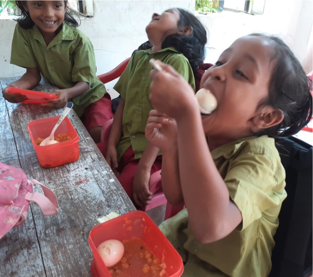 Child with education eggs